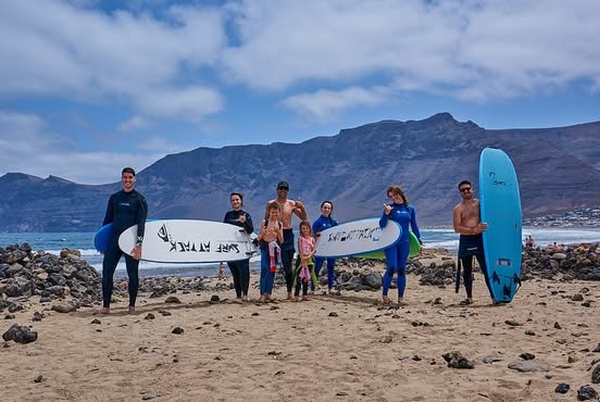 Beginner Group surf lesson at famara Lanzarote. Famara best surf Beach 