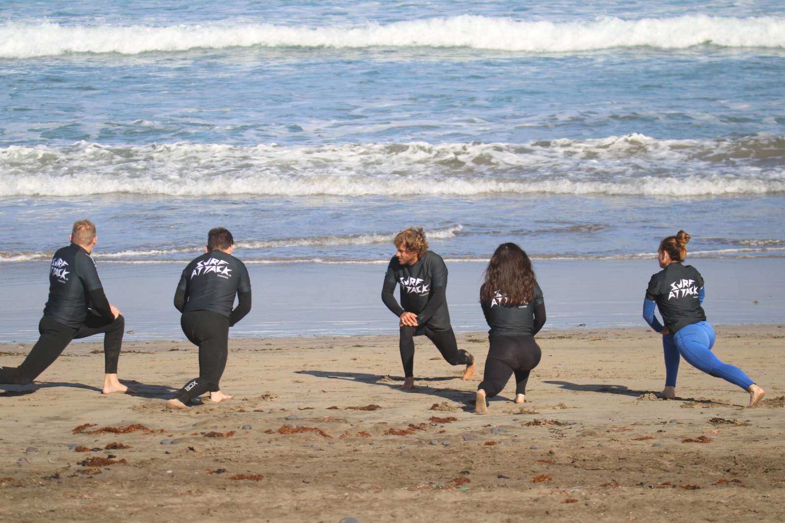 Small group surf lesson on Famara Beach, Lanzarote with expert instructors and full equipment provided