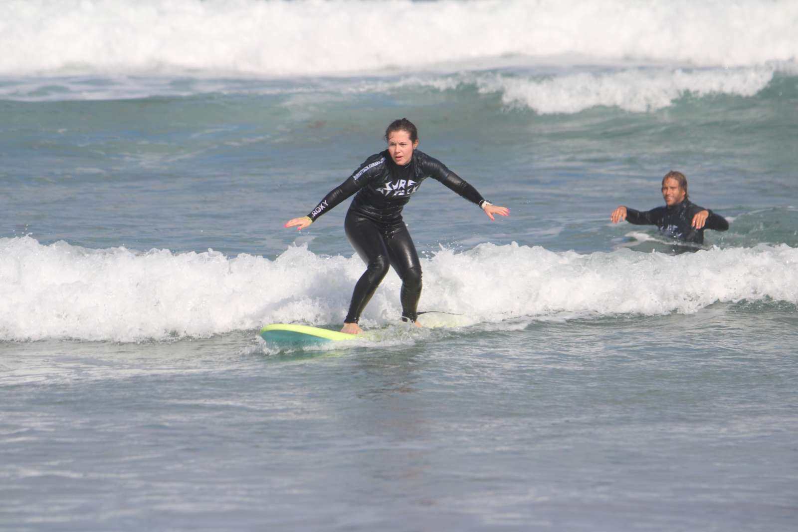 Small group surf lesson on Famara Beach, Lanzarote with expert instructors and full equipment provided