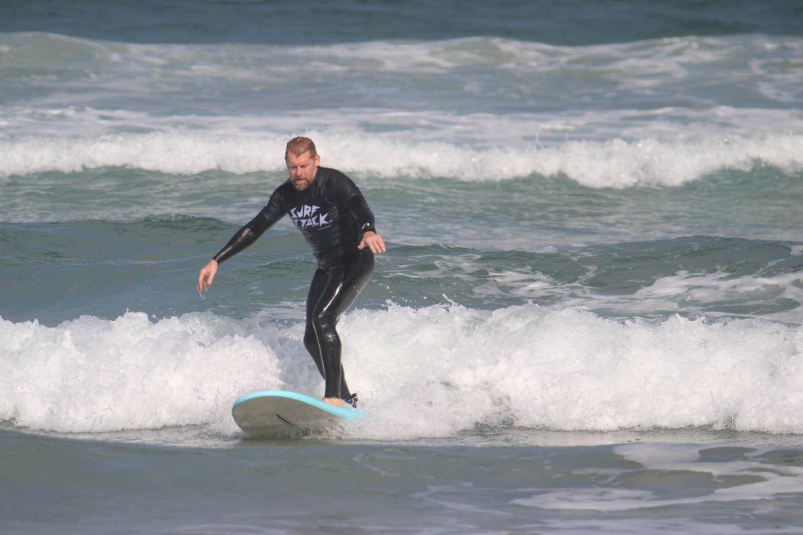 Small group surf lesson at Famara Beach, Lanzarote with expert coaching and all equipment provided