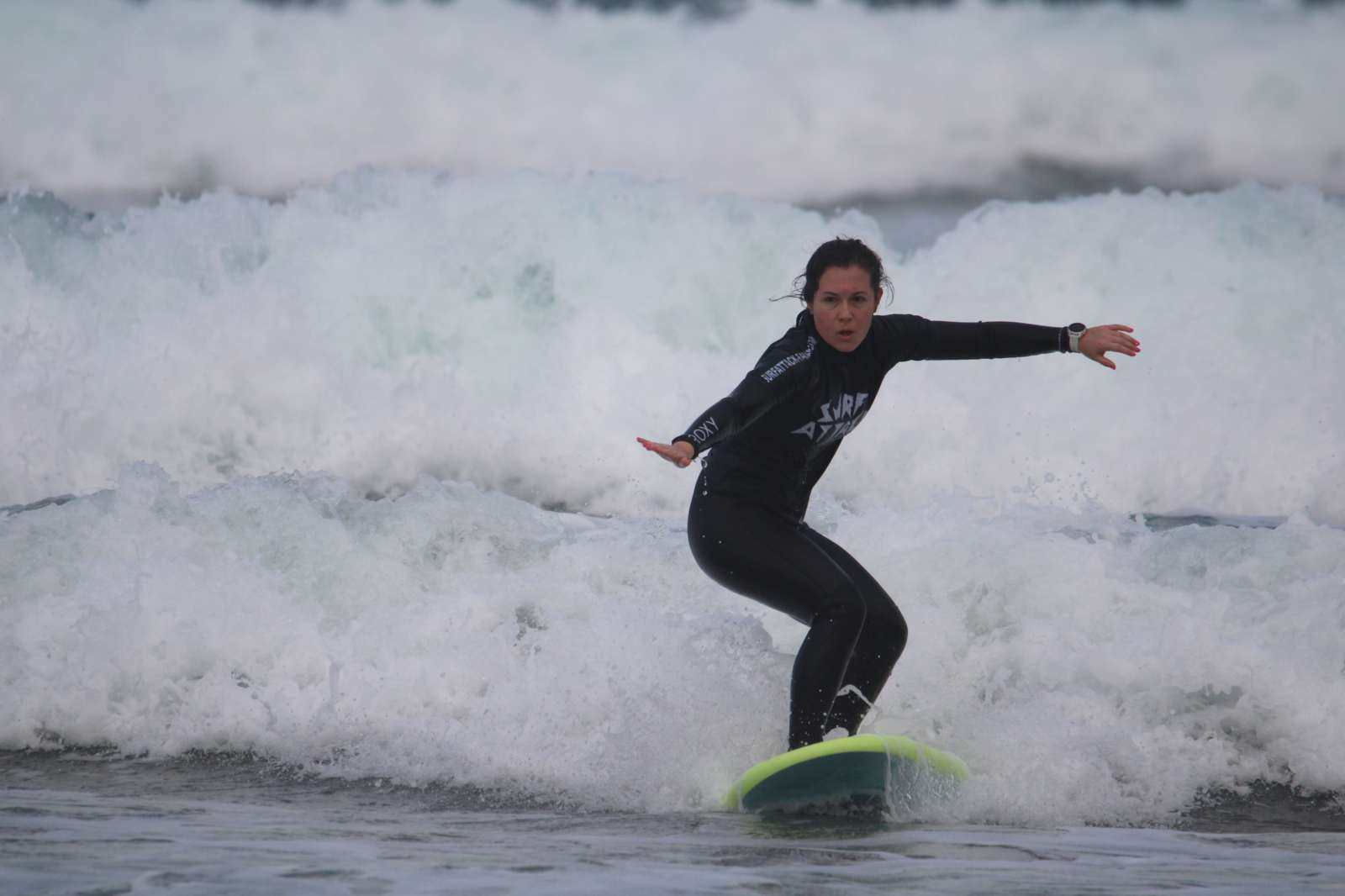 Small group surf lesson on Famara Beach, Lanzarote with expert instructors and full equipment provided
